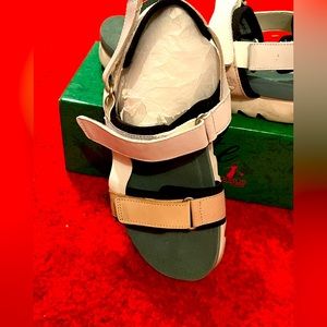 Timberland sandel size 9 white, pink, and teal.